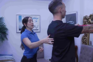 chiropractor assisting a patient with Body Balance Therapy at the Back2Balance clinic